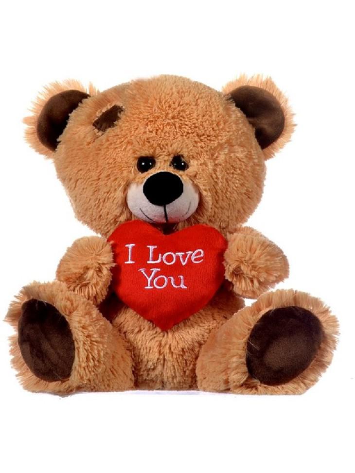 Peluche de oso con corazón mide unos 20 cm